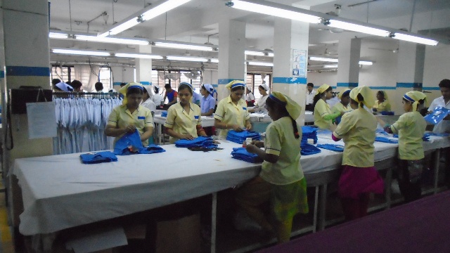 Quality inspection of garments in a compliant Bangladesh factory led by Antor Hossain