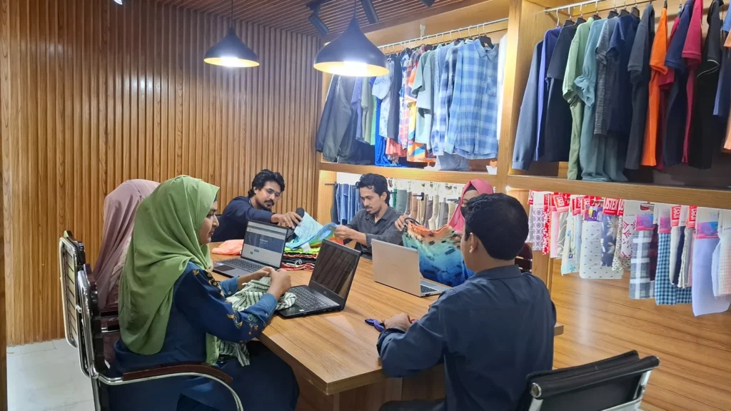 Garment merchandising team meeting in Bangladesh showroom